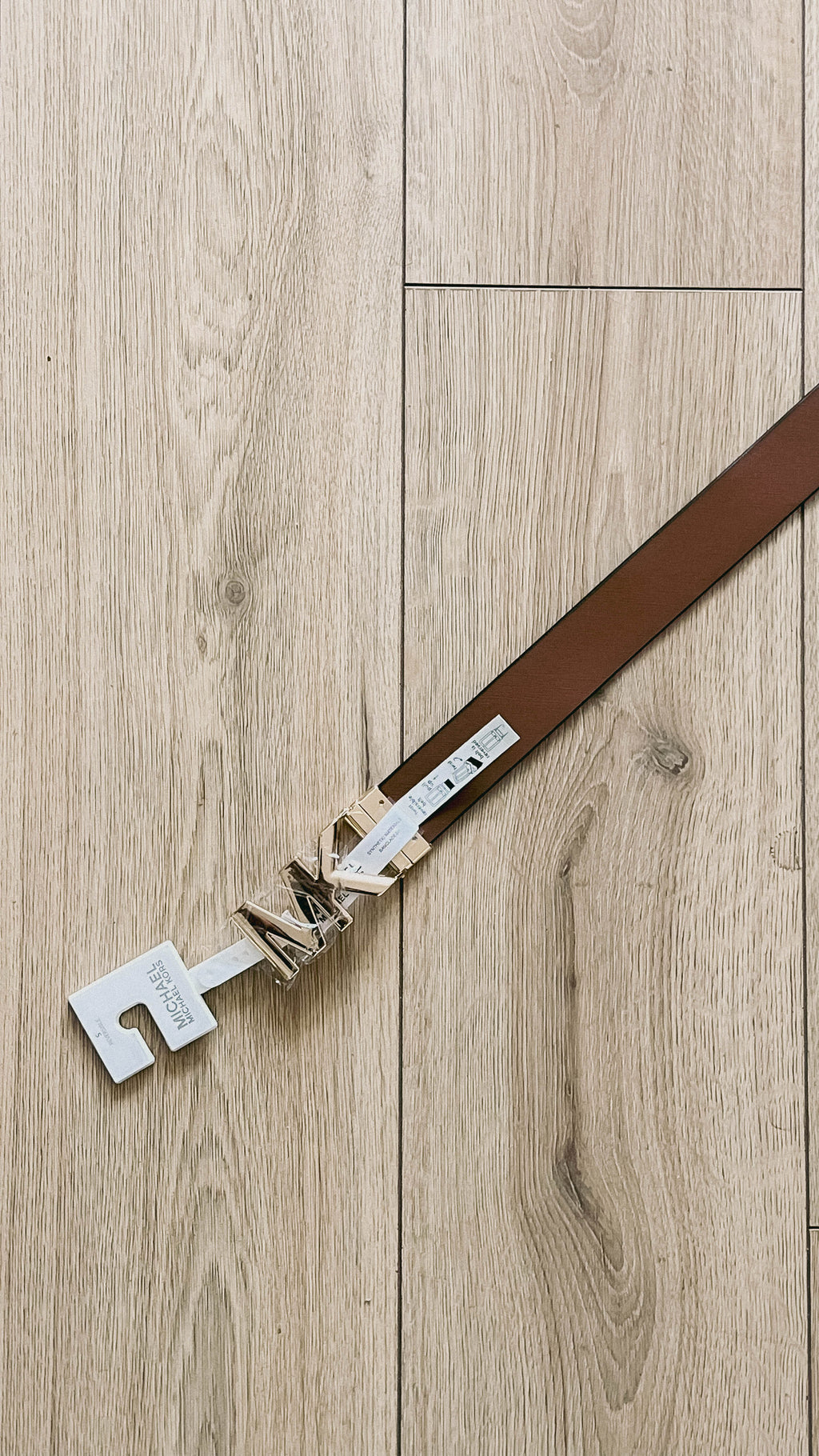 Cinturón MK Monograma White Reversible Brown